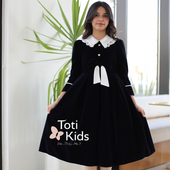 صورة فستان بناتي مخمل بـلونين بفيونكة | تصميم كلاسيكي بتفاصيل كم مميزة- 1122